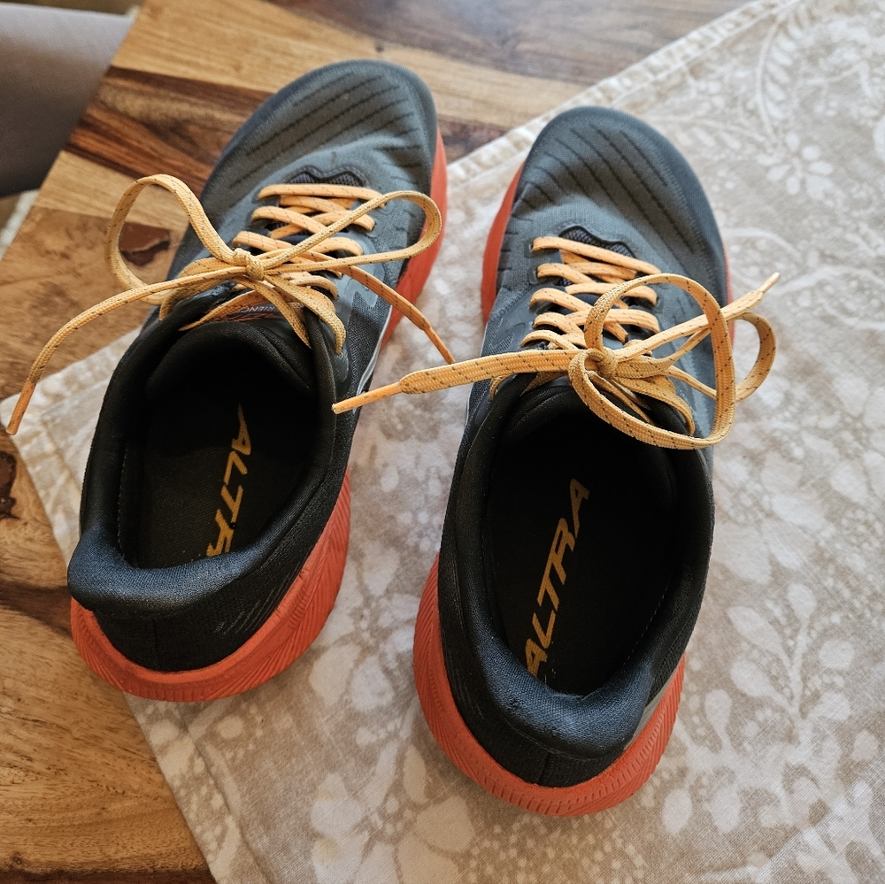 Altra Trail Running Shoes in Gray with Orange Soles and Yellow Laces